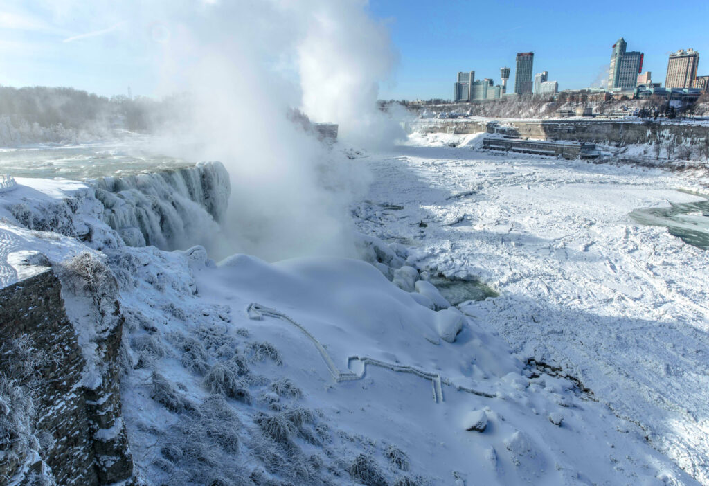 The American Falls encased in snow and ice in mid-winter