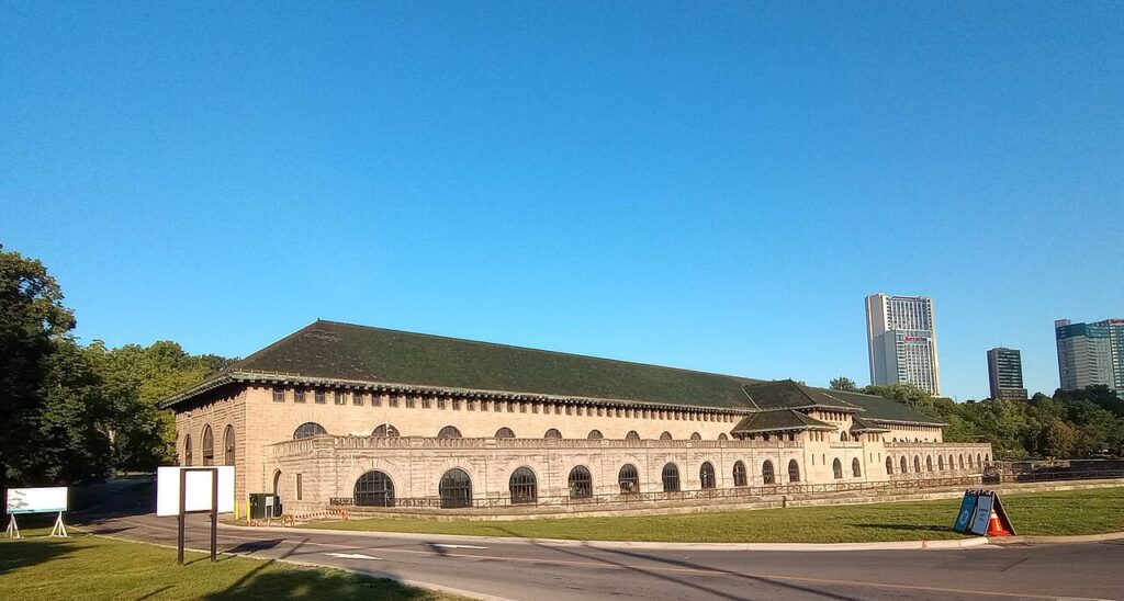 The long stone facade of the former Rankine generating station on the Niagara River bank in Ontario
